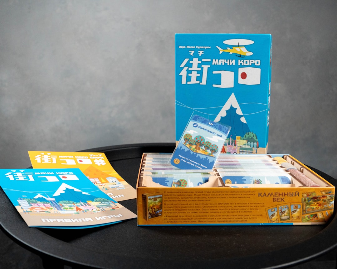 a black table topped with a box of books