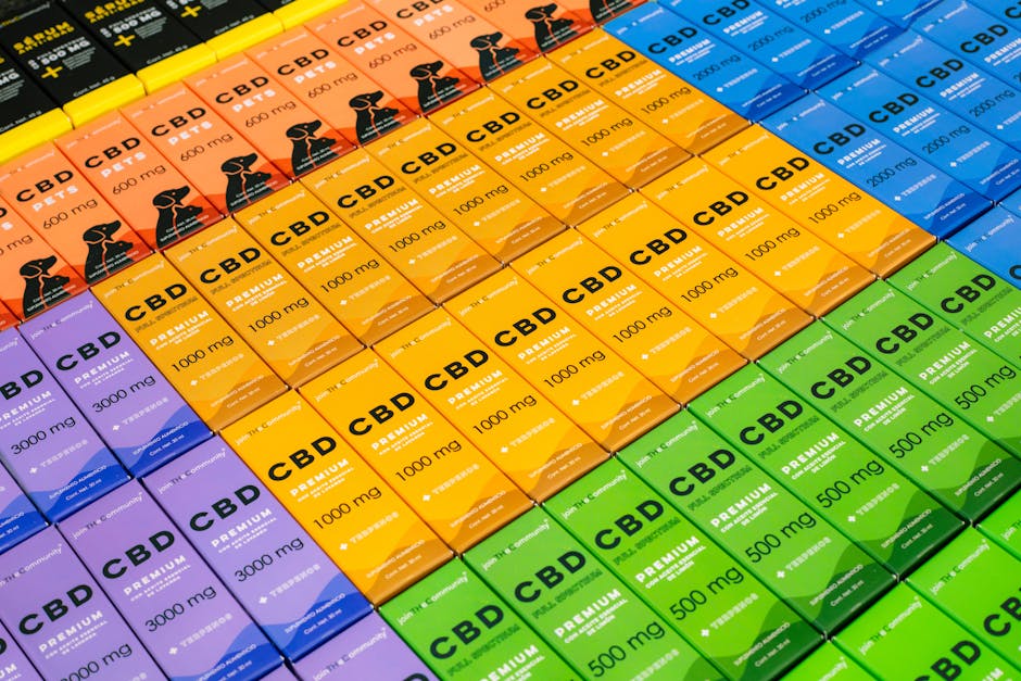 A vibrant array of CBD product boxes in various colors, photographed in Mexico City.