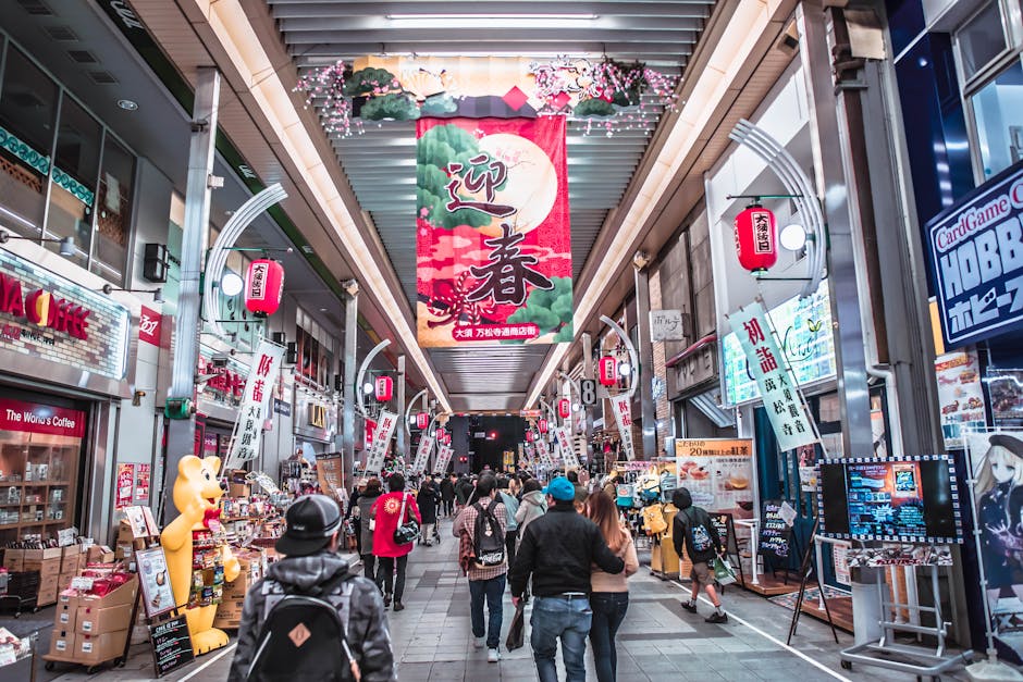 A bustling shopping arcade in Japan with diverse shops and people enjoying their day.