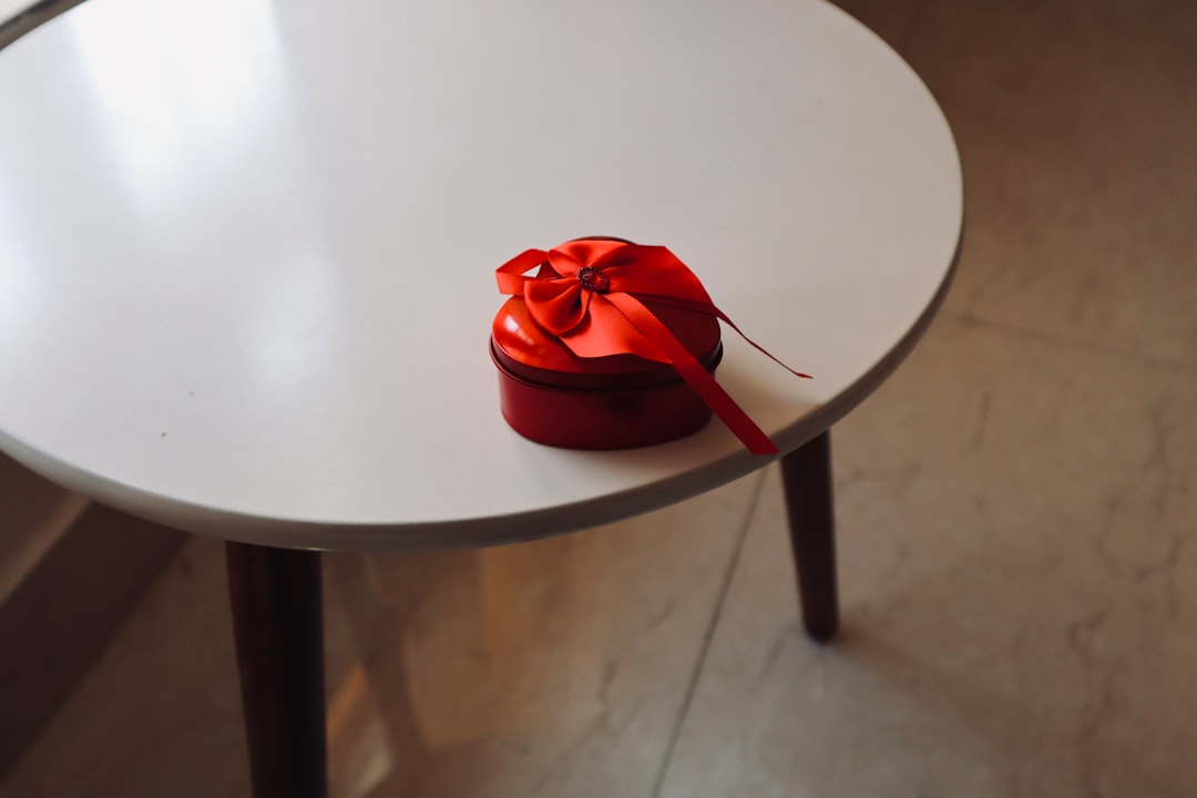 a round table with a red bow on it