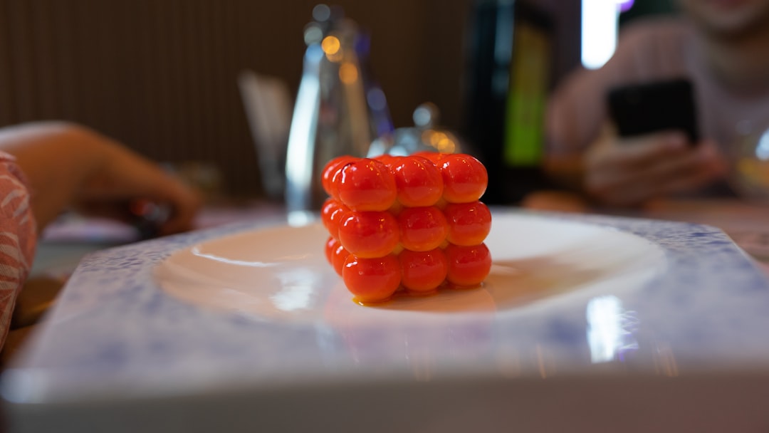 red round medication pill on white table