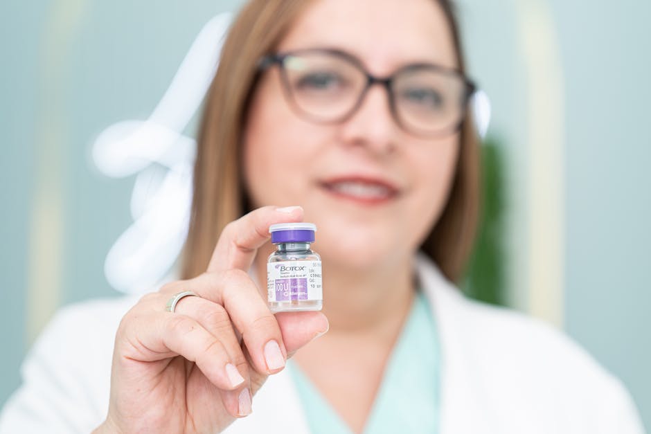 A woman holding a Botox vial, highlighting aesthetic medical cosmetics and beauty treatment.