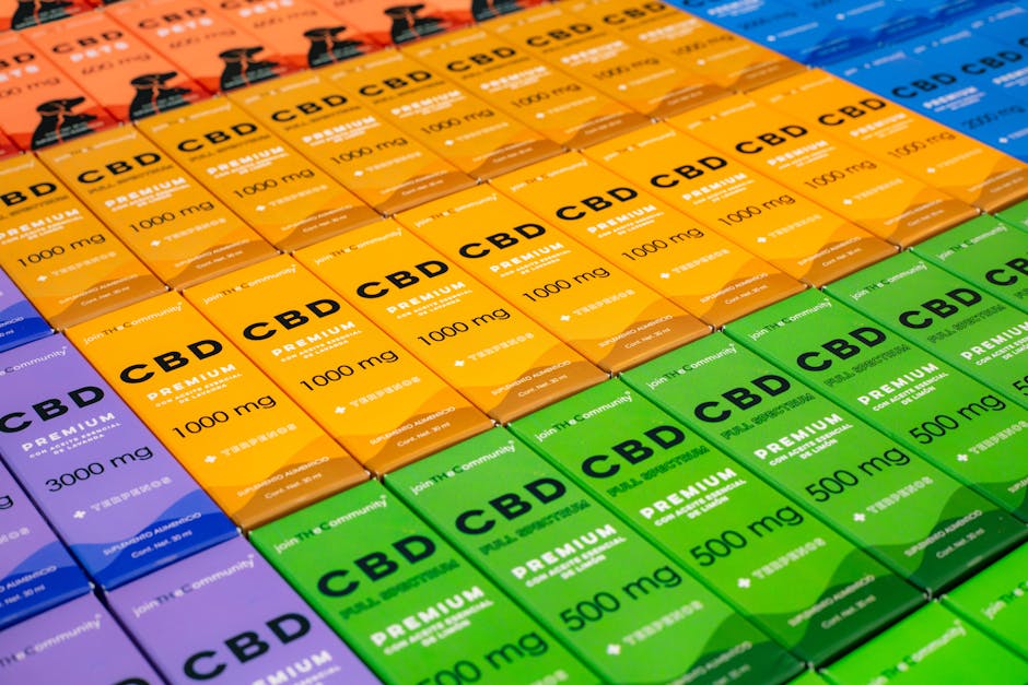 Multi-colored CBD product boxes arranged neatly in a retail display in Mexico City.